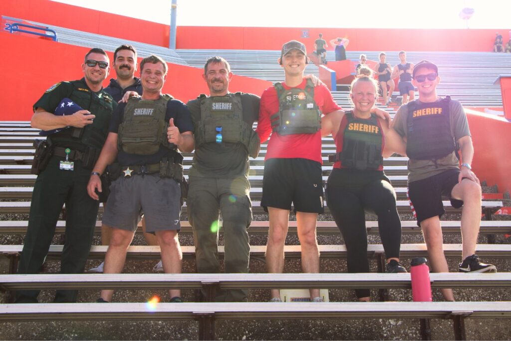 Members of Alachua County Sheriff's Office honor the lives lost on 9-11-01 with the annual stair climbing event at Ben Hill Griffin Stadium. Photo by Lillian Hamman