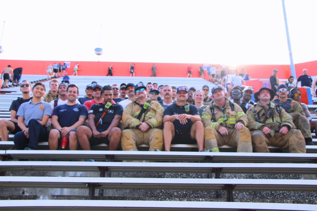 Members of Gainesville Fire Rescue honor the lives lost on 9-11-01 with the annual stair climbing event at Ben Hill Griffin Stadium. Photo by Lillian Hamman