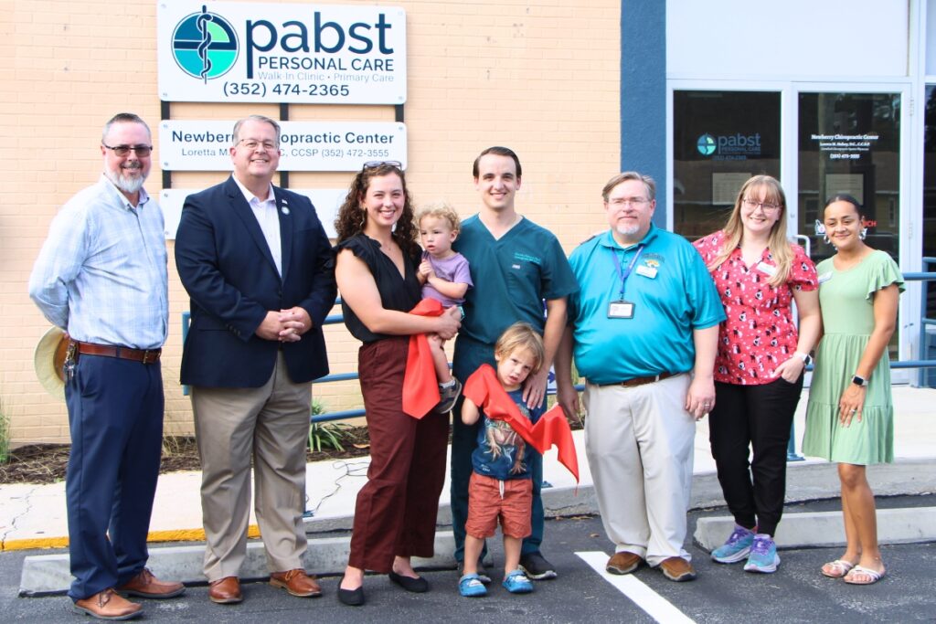 Newberry city officials, including City Manager Jordan Marlowe (far left) and Mayor Tim Marden (second from left) celebrate opening of Pabst Personal Care with owner David Pabst (center) and family.