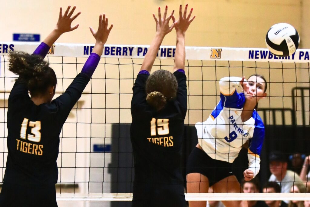 Newberry's Carly Myers (9) with a hit against Union County. Photo by C.J. Gish 1 (1)