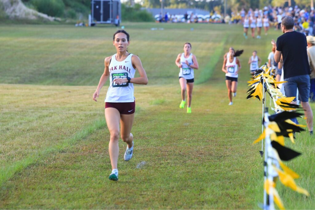 Oak Hall senior Estella Collante leads the Bobcat Classic and ended with a second-place finish. Photo by Seth Johnson