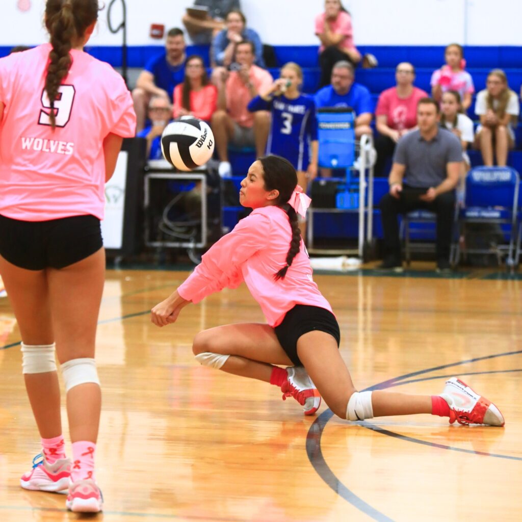 Saint Francis Catholic's Isabella Morales (4) with a dig against The Rock. Photo by C.J. Gish