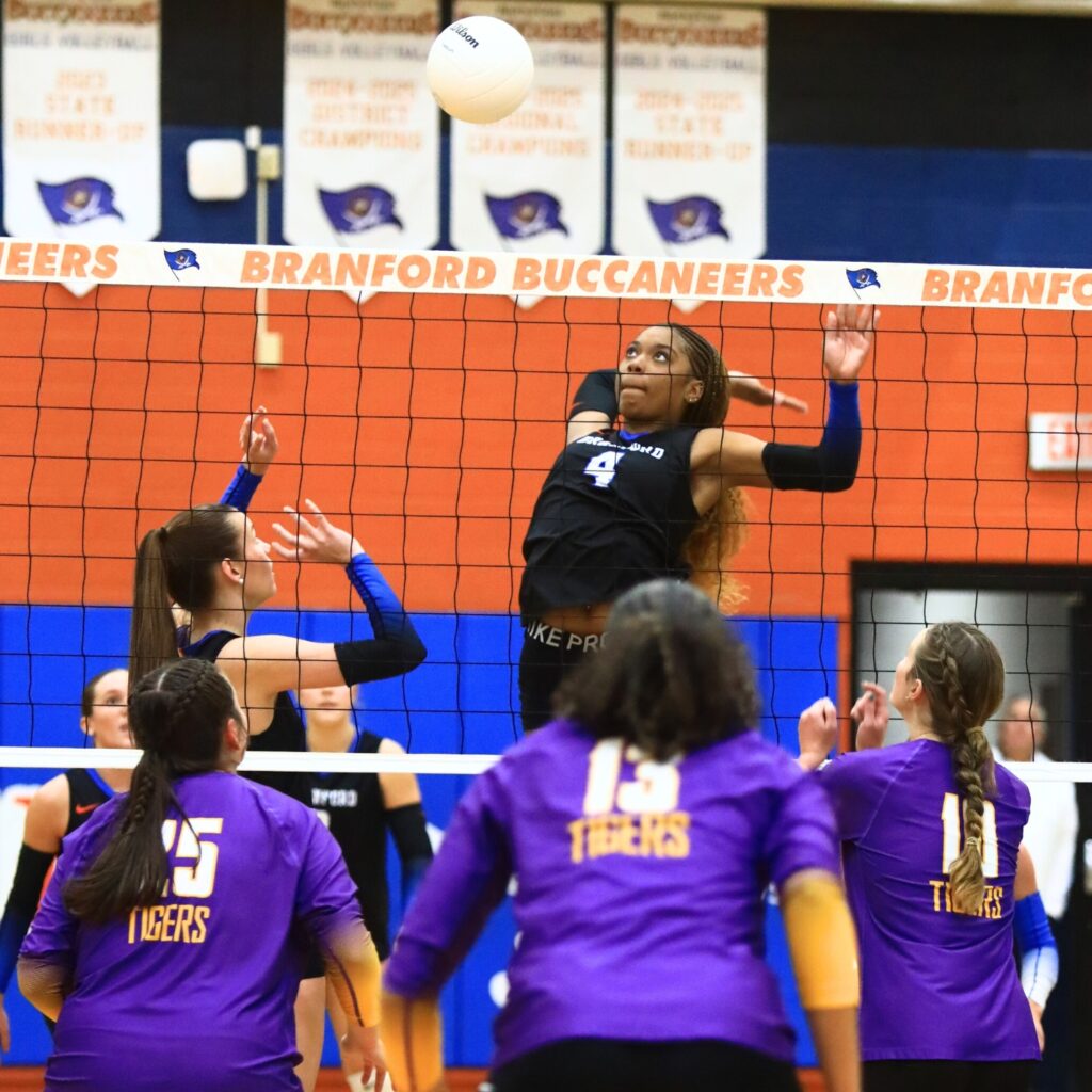 Branford's Adriauna Combs (4) with a hit against Union County. Photo by C.J. Gish