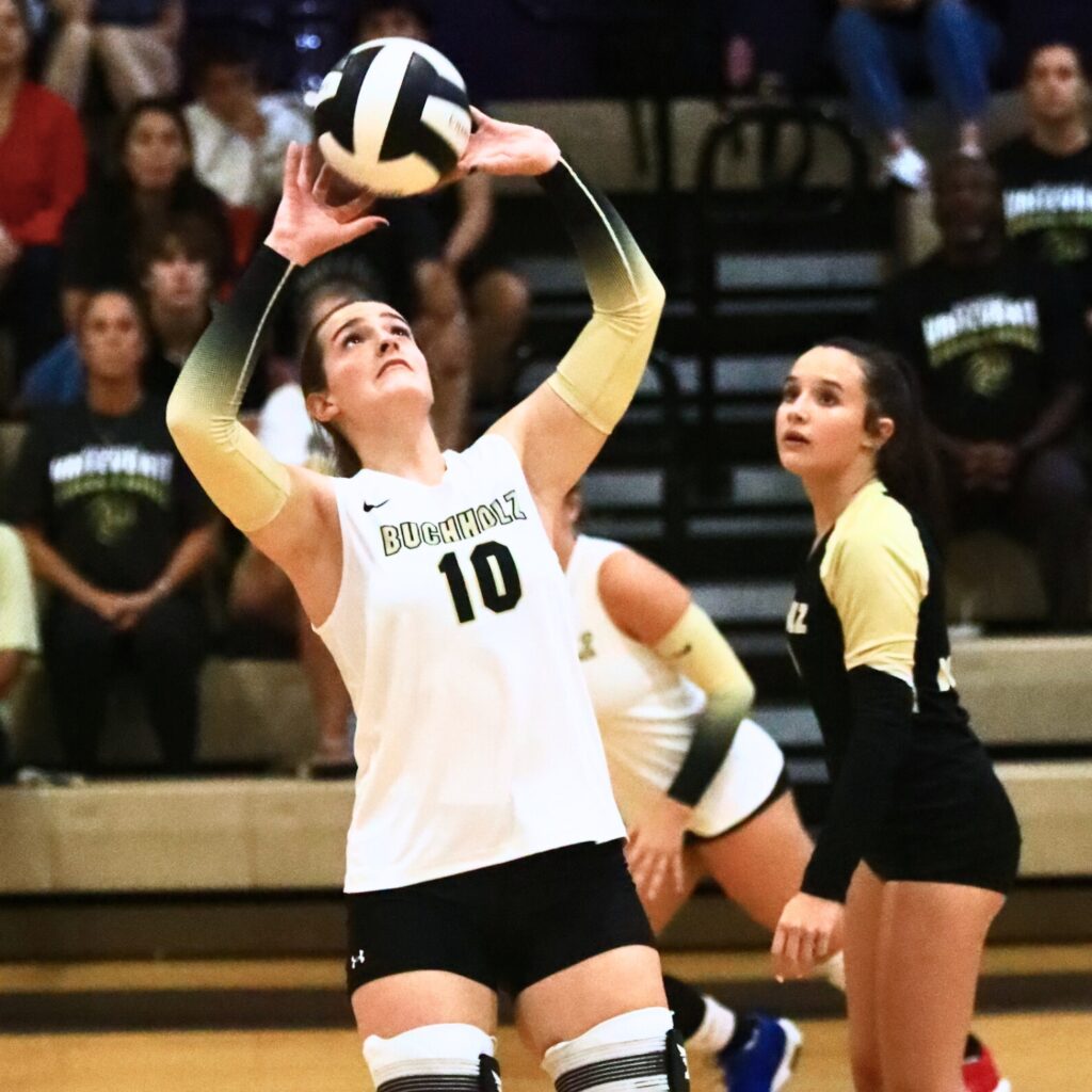 Buchholz's Sophia Lingis (10) with a set against Gainesville. Photo by C.J. Gish