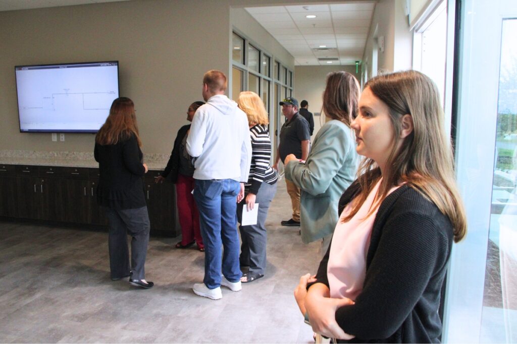 Ceremony attendees toured the new city of Alachua operations building on site of water management facility. Photo by Lillian Hamman