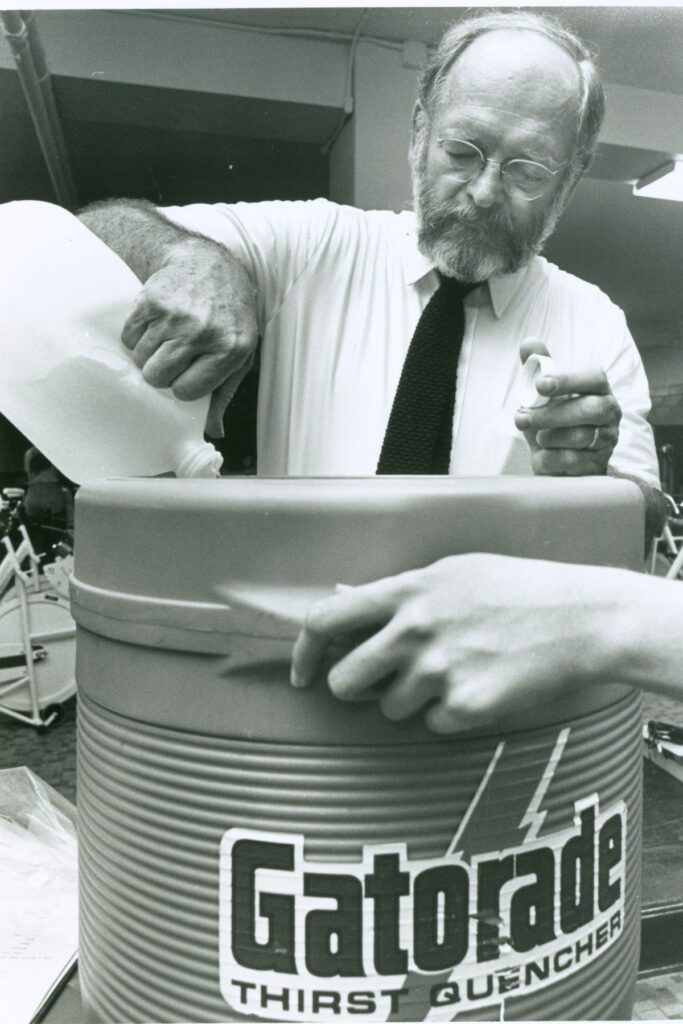 Dr. Robert Cade mixes a batch of Gatorade in 1977. Courtesy of FleishmanHillard