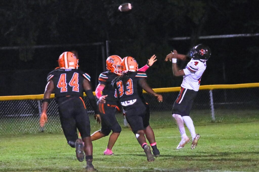 Eastside defenders swarm the South Sumter quarterback, forcing an incomplete pass. Photo by Seth Johnson