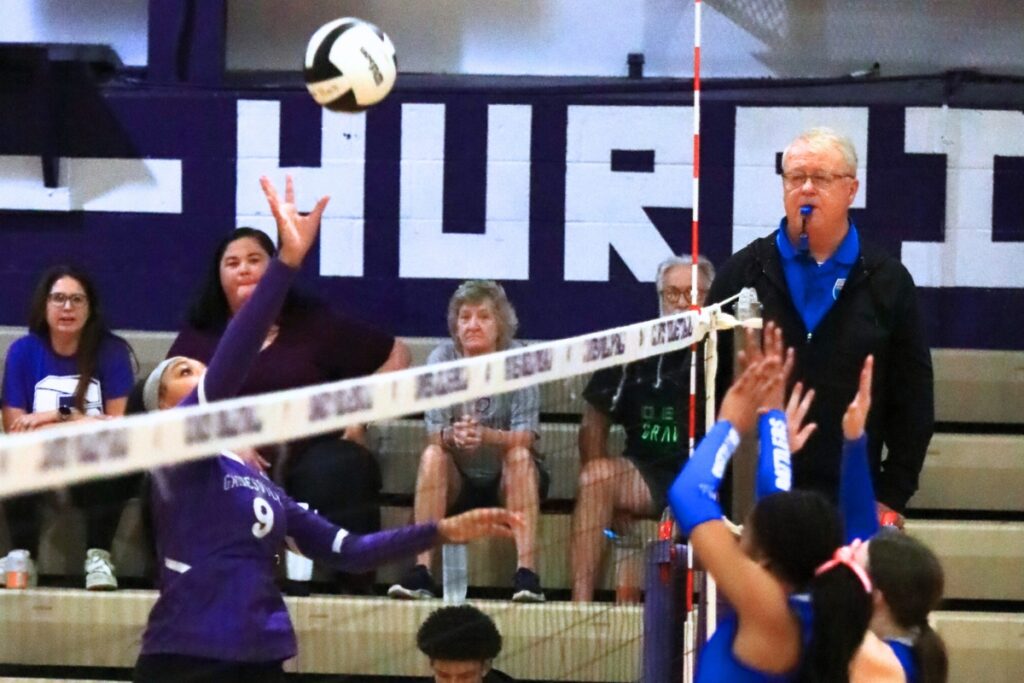 Gainesville's Cornariah White (9) with a hit against Belleview in the Class 5A-District 5 semifinals. Photo by C.J. Gish