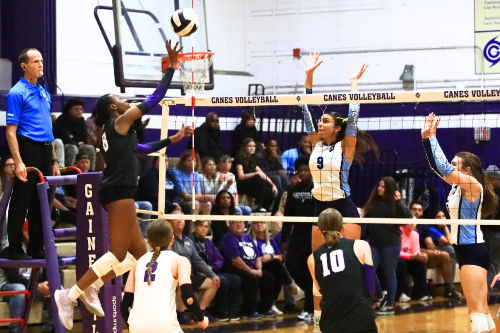 Gainesville's Jorryn Dye (8) with a hit against Legacy (Port St. Lucie) in the Class 5A Region 2 Final. Photo by C.J. Gish