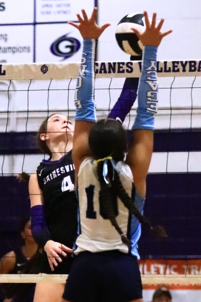 Gainesville's Rowan Kage (4) with a hit against Legacy (Port St. Lucie) in the Class 5A Region 2 Final. Photo by C.J. Gish