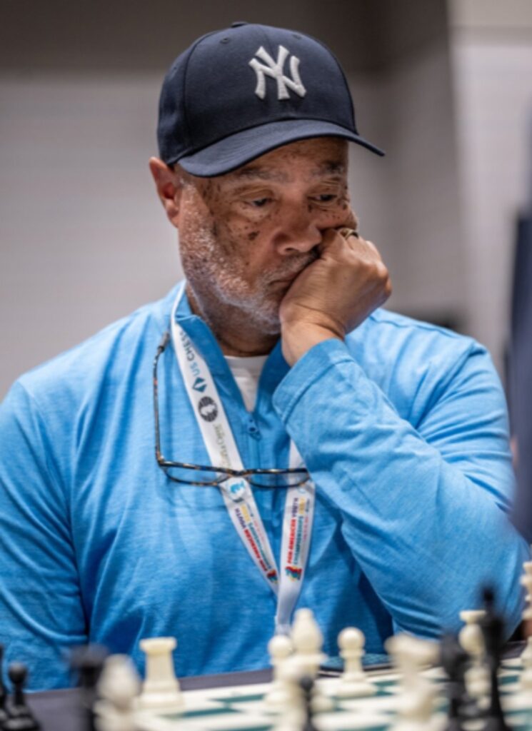 Kevin Pryor studies a position while playing at a tournament. Courtesy Kevin Pryor