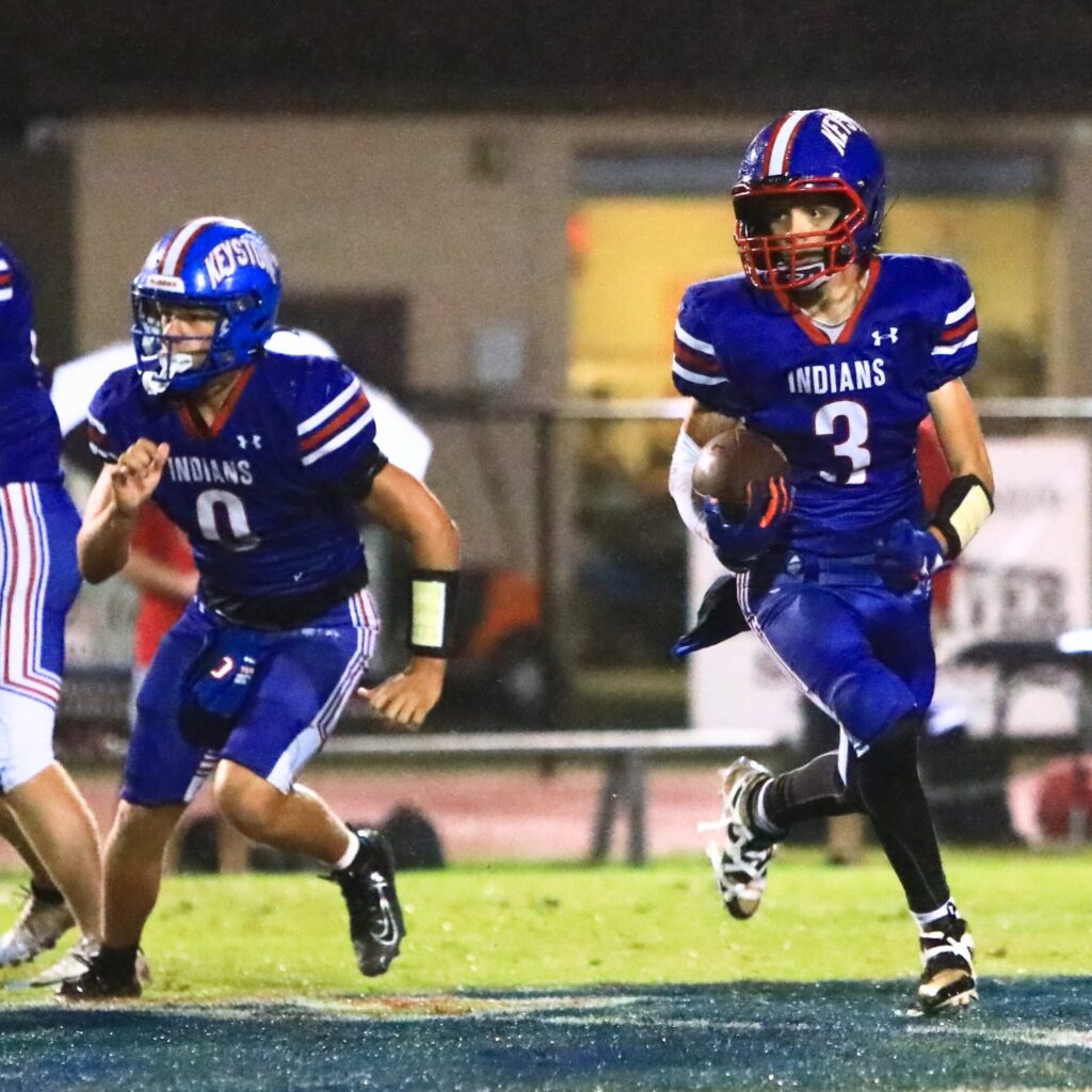 Keystone Heights' Cole Crabtree (3) wtih a first-quarter run against Santa Fe. Photo by C.J. Gish