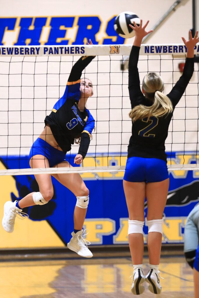 Newberry's Carly Myers (9) with a hit against Palatka in the Class 3A-District 5 semifinals. Photo by C.J. Gish