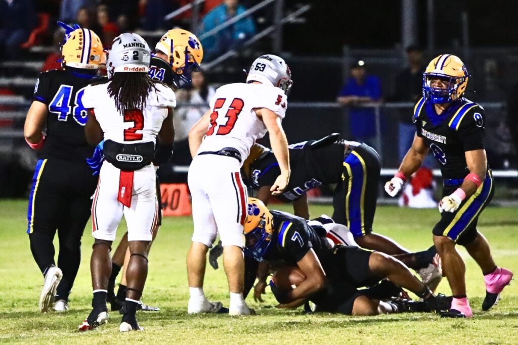 Newberry's Darius Debose (7) recovers a third-quarter Williston fumble. Photo by C.J. Gish