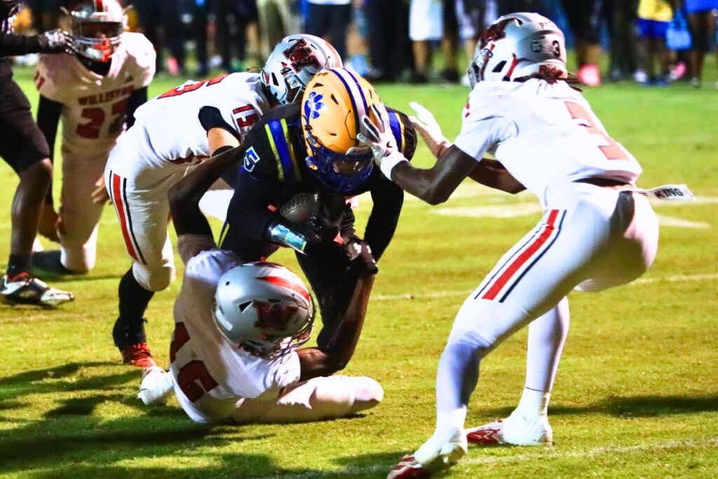 Newberry's Jamarcus Wimberly (5) scores a second-quarter touchdown against Williston. Photo by C.J. Gish