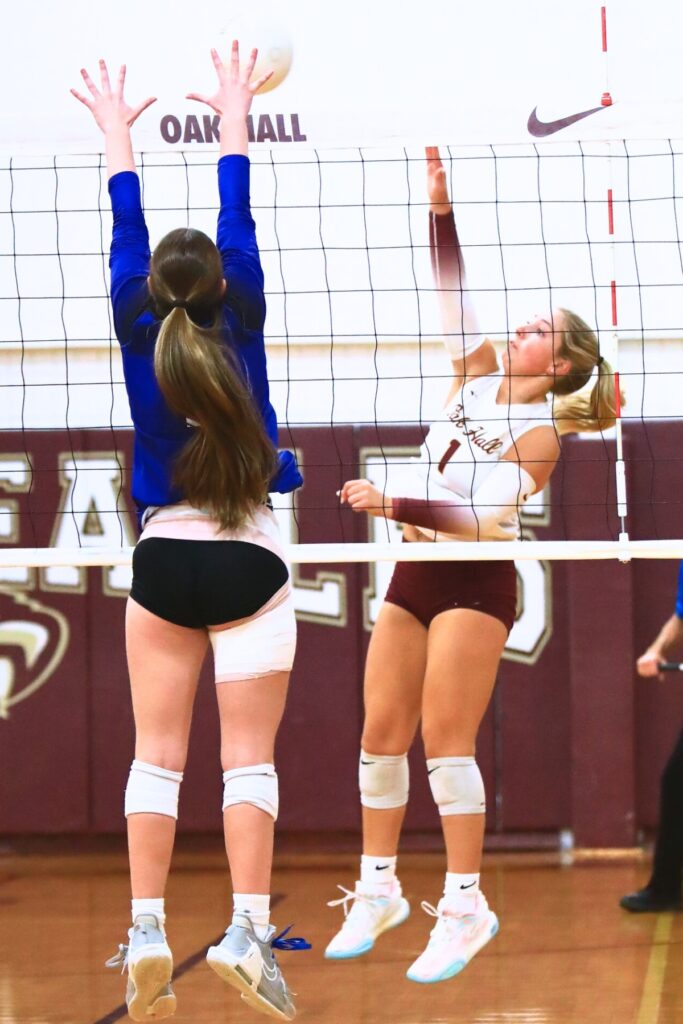 Oak Hall's Haley Janes (1) with a hit against Saint Francis Catholic. Photo by C.J. Gish