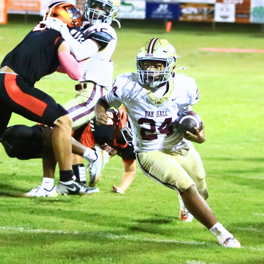 Oak Hall's Jeremiah Taylor (24) with a second-quarter run against Trenton. Photo by C.J. Gish