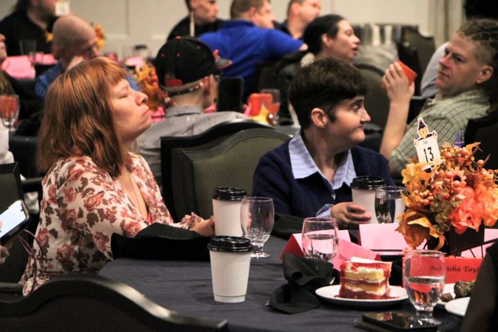 The Arc annual meeting attendees watch a dance performance during the anniversary celebration. Photo by Lillian Hamman