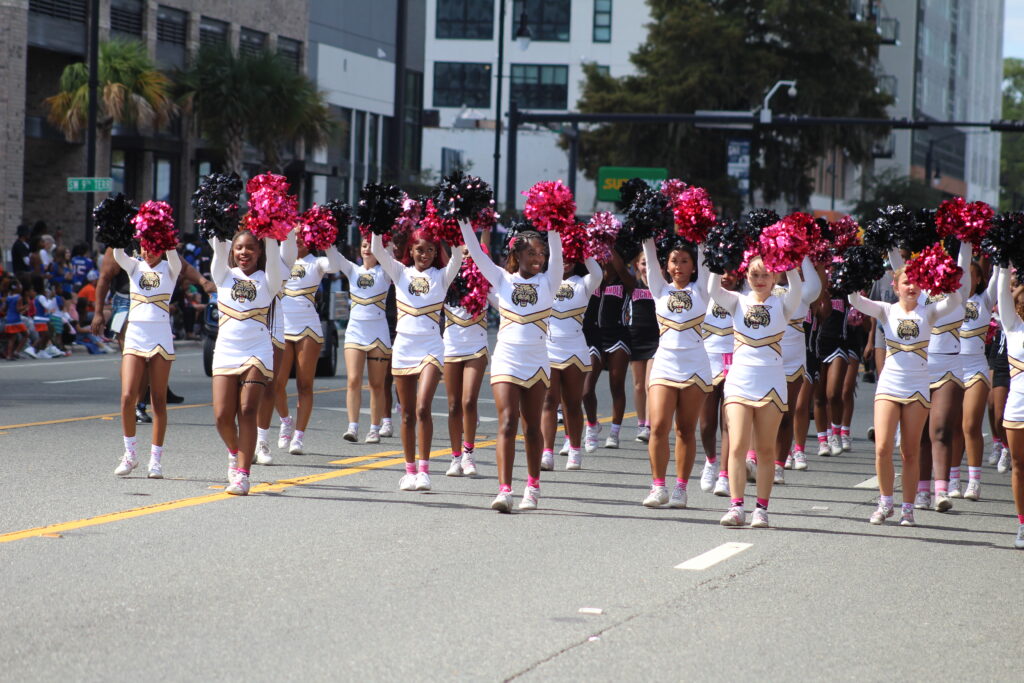 The Buchholz High School cheerleaders in the UF Homecoming Parade