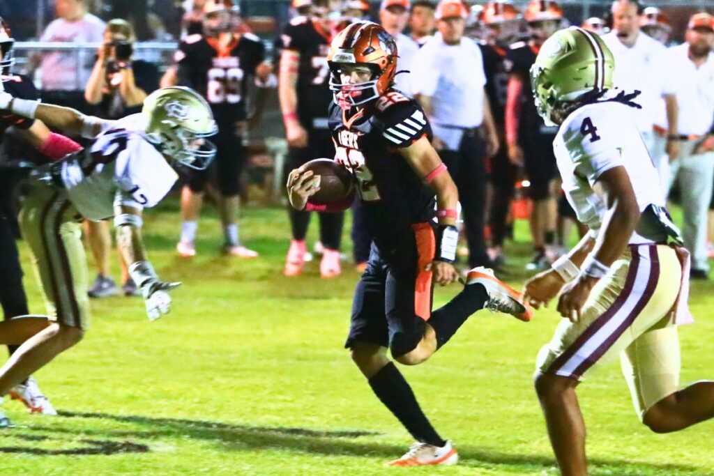 Trenton's Wyatt Vanlandingham (22) runs to the end zone for his second first-quarter touchdown against Oak Hall. Photo by C.J. Gish