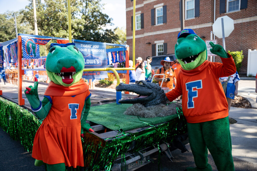 UF's Albert and Alberta standing with the 1978-1983 mascot head.