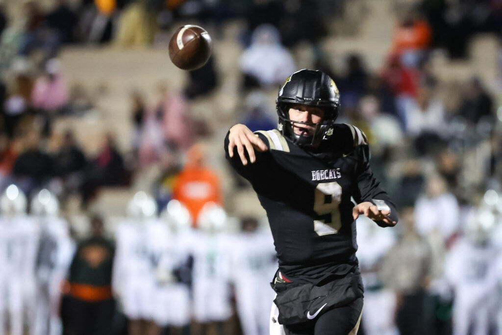 
Buchholz player Andrew Whittemore (9) throws the ball during the second half Friday night against Mandarin. 