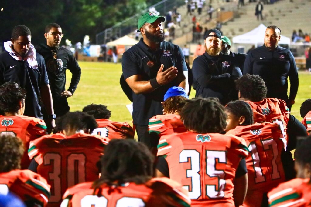 Eastside coach Harold 'Gator' Hoskins talks to his team after defeating South Sumter in the Region 2-3A Quarterfinals. Photo by C.J. Gish