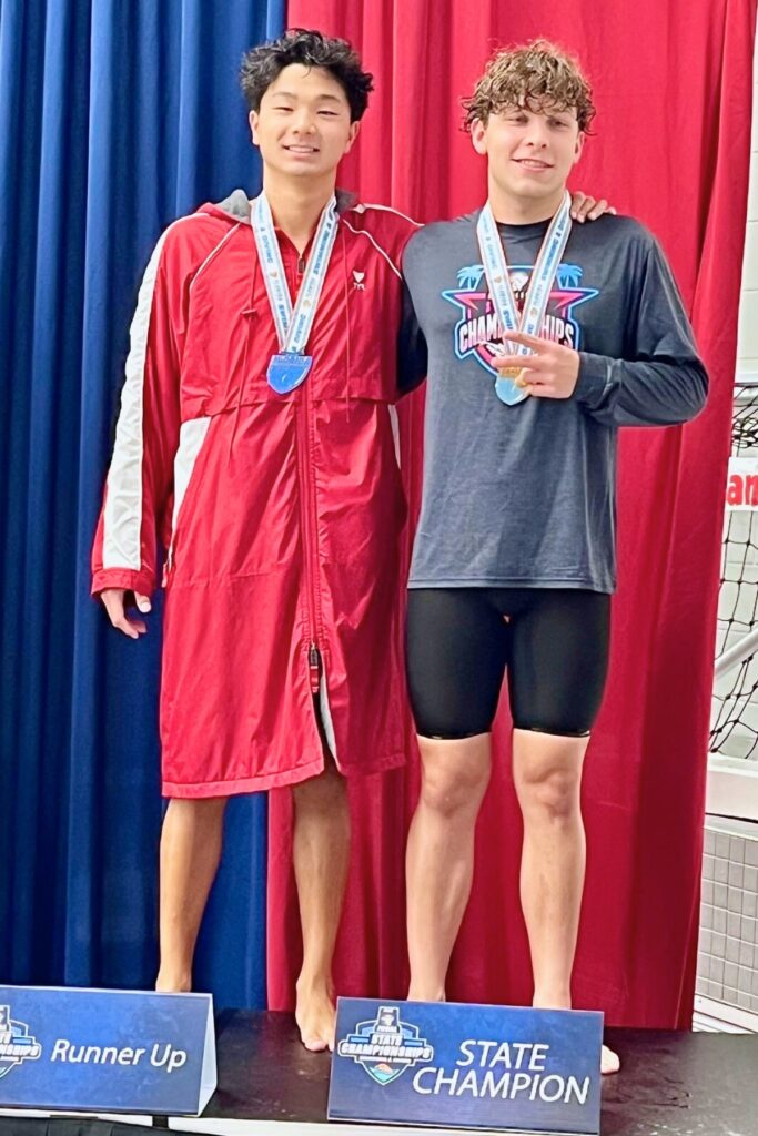Eastside's Christopher Jeong (left) took second behind Vanguard's Parker Stever in the 500-yard freestyle at the 2A State Swim Championships. Courtesy of Jon Allen