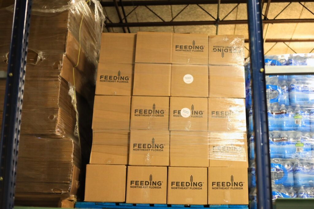 Emergency small boxes sit ready on the shelves of Bread of the Mighty. Photo by Seth Johnson