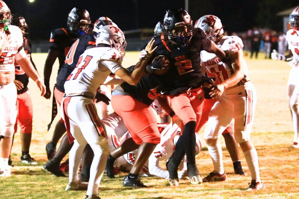 Hawthorne's Nathan Jennings (2) scores to put the Hornets ahead 12-0 against Williston in the Rural-Region 4 Final. Photo by C.J. Gish