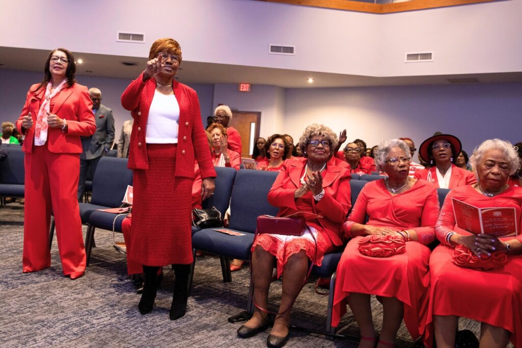 Members of The Charmettes dance and sing along with performers. Photo by Megan V. Winslow