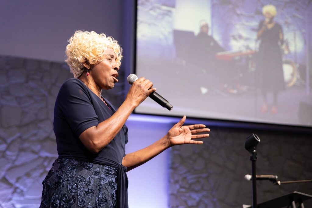 Singer Sebrena Phillips performs a solo during the program. Photo by Megan V. Winslow