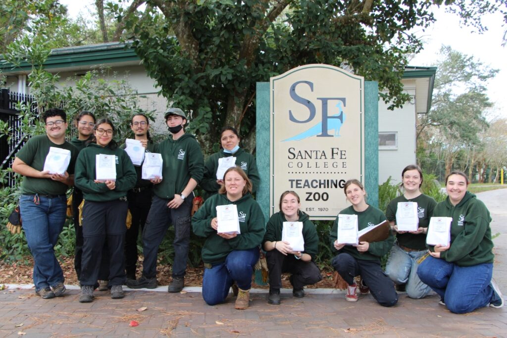 Student working at Santa Fe College Teaching Zoo on Thanksgiving receive lunches from Operation Turkey Sandwich. Photo by Lillian Hamman