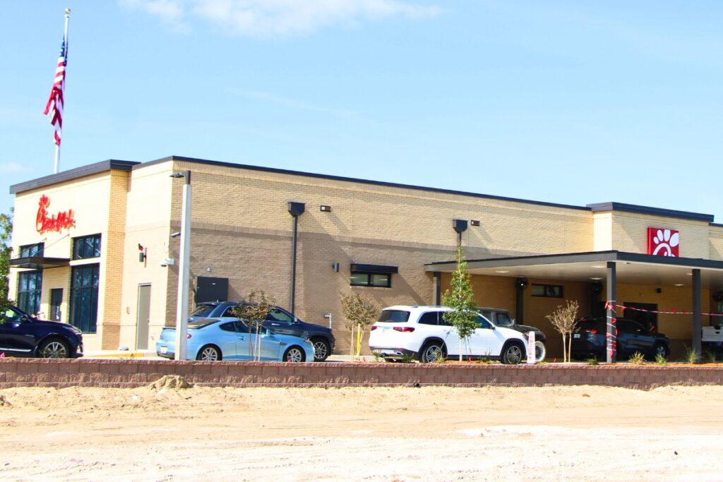 Two lines of cars wrap around Chick-fil-A drive-thru on opening day Thursday. Photo by Lillian Hamman