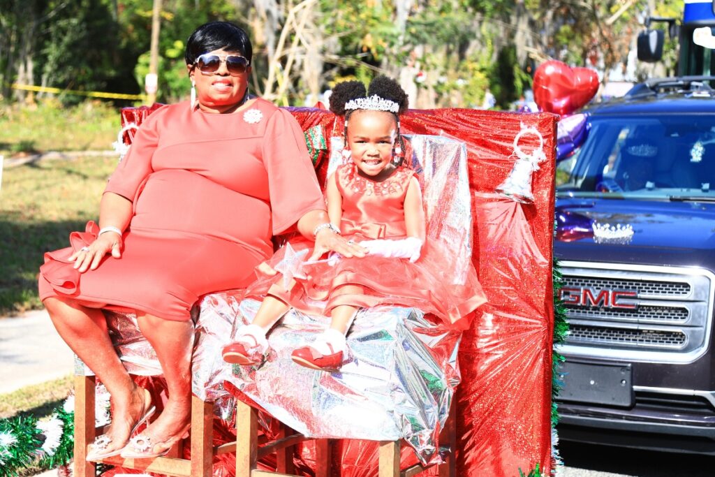 2025 Sugarhill princess Harlow Ross (right) at the 2025 A Very GNV Holiday Parade. Photo by C.J. Gish