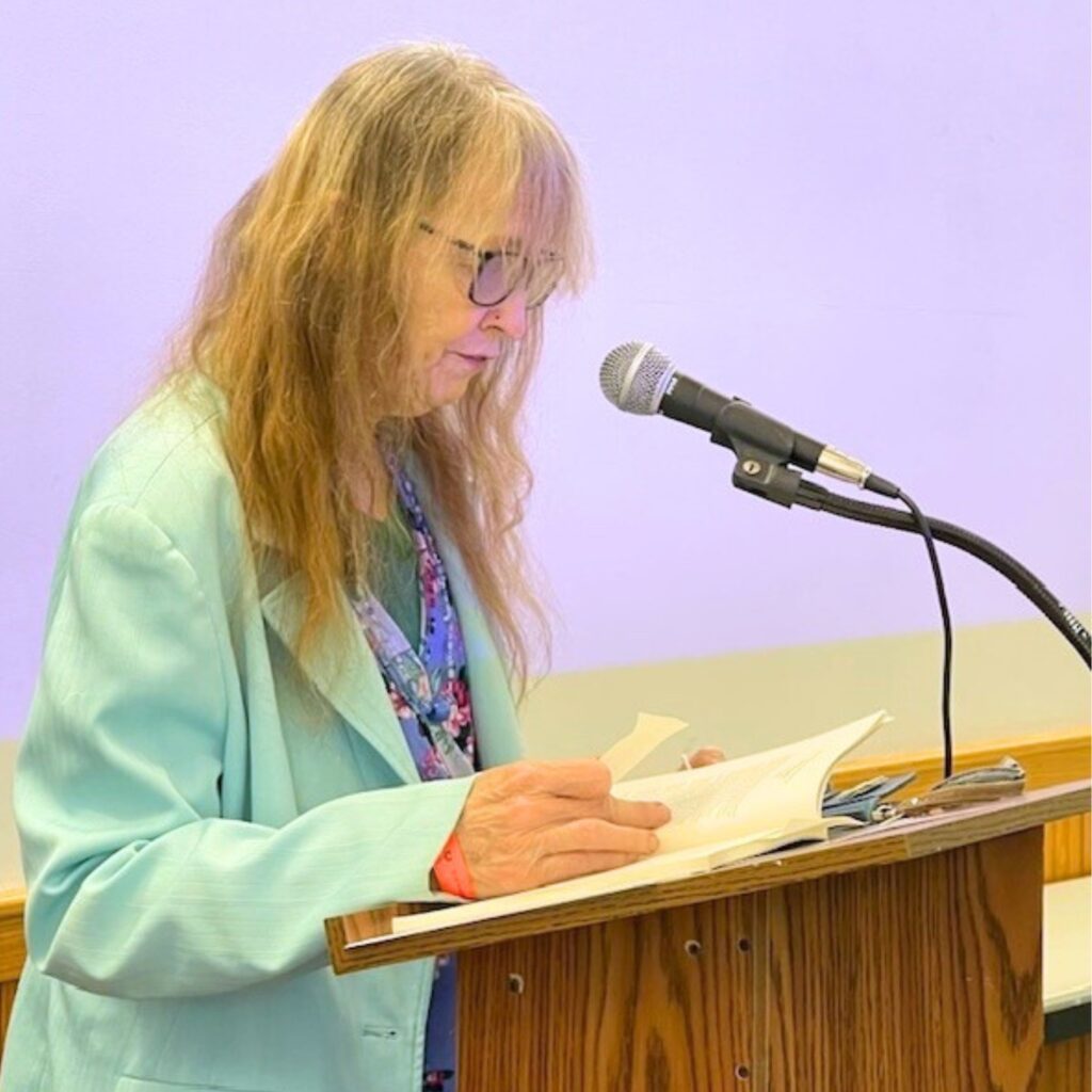 Bacopa Fiction Editor Wendy Thornton reads from the winning fiction entry. Photo by Jenny Dearinger