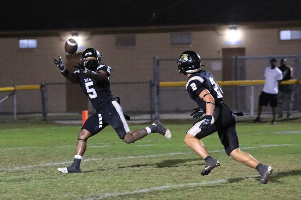 Buchholz's Caleb Young Jr. intercepts a West Broward pass.