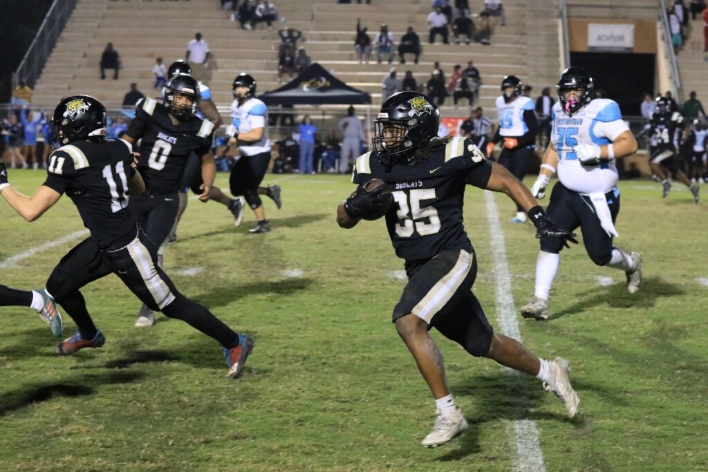 Buchholz's Zay Robinson returns an interception.