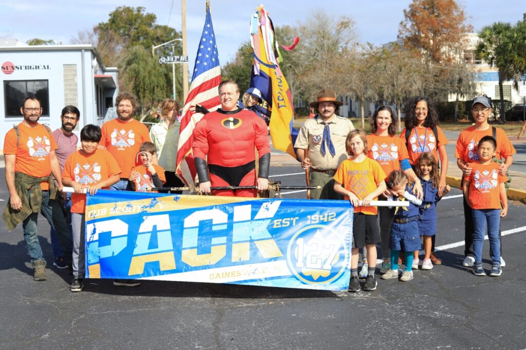 Cub Scout Pack 127 prepares to march in A Very GNV Holiday Parade. Photo by Seth Johnson