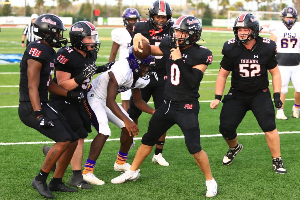 Fort White's Ezekiel Powell (0) scores a fourth-quarter touchdown against Port St. Joe in the Rural Florida Invitation Tournament Championship game. Photo by C.J. Gish 1 (1)
