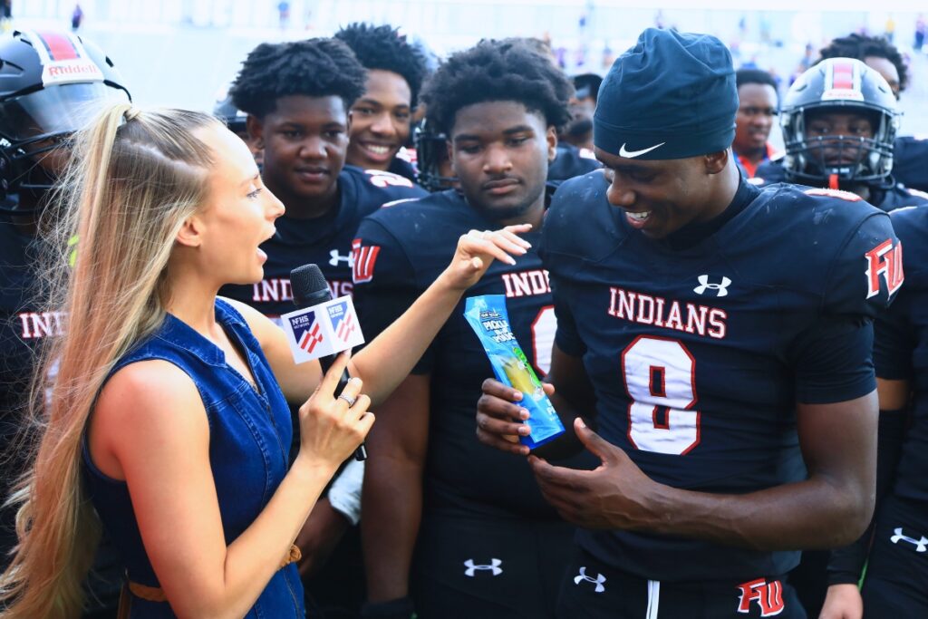 Fort White's Jayden Jackson (8) jokingly receives pickle juice after the game against Port St. Joe in the Rural Florida Invitation Tournament Championship game. Photo by C.J. Gish