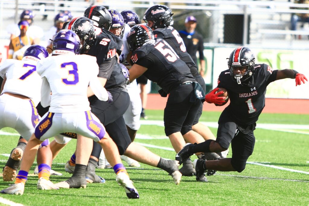 Fort White's John Lawson (1) with a second-quarter run against Port St. Joe in the Rural Florida Invitation Tournament Championship game. Photo by C.J. Gish