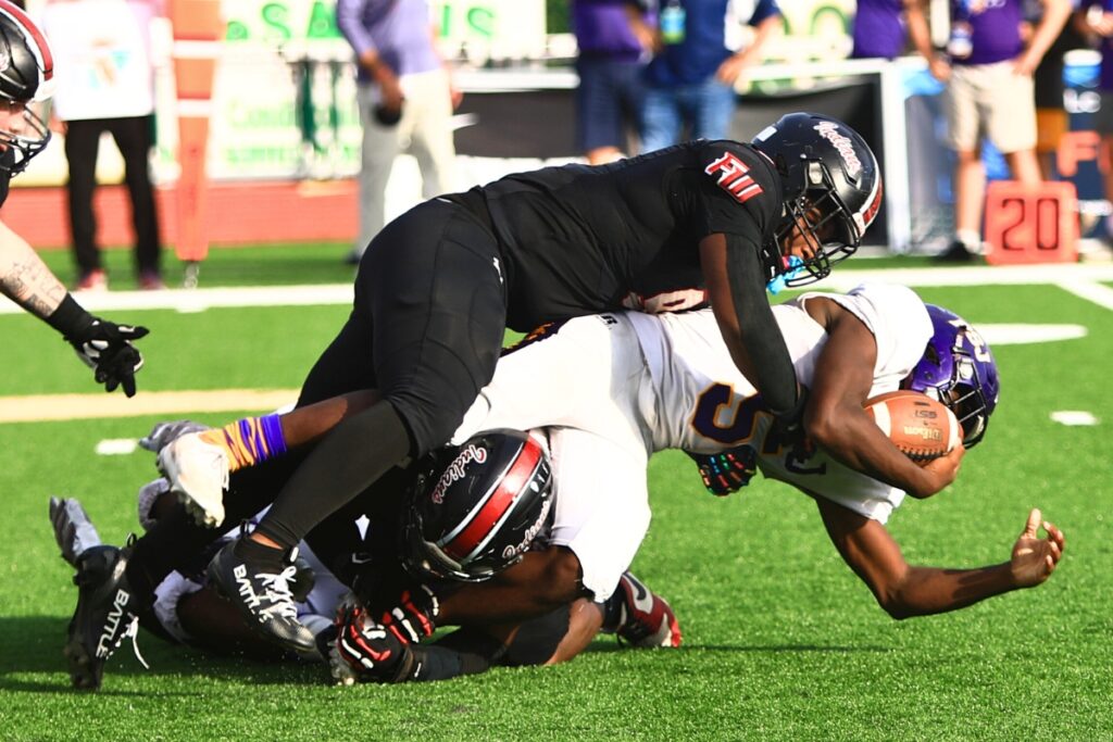 Fort White's Josiah Harmon (9) with a fourth-quarter tackle against Port St. Joe in the Rural Florida Invitation Tournament Championship game. Photo by C.J. Gish