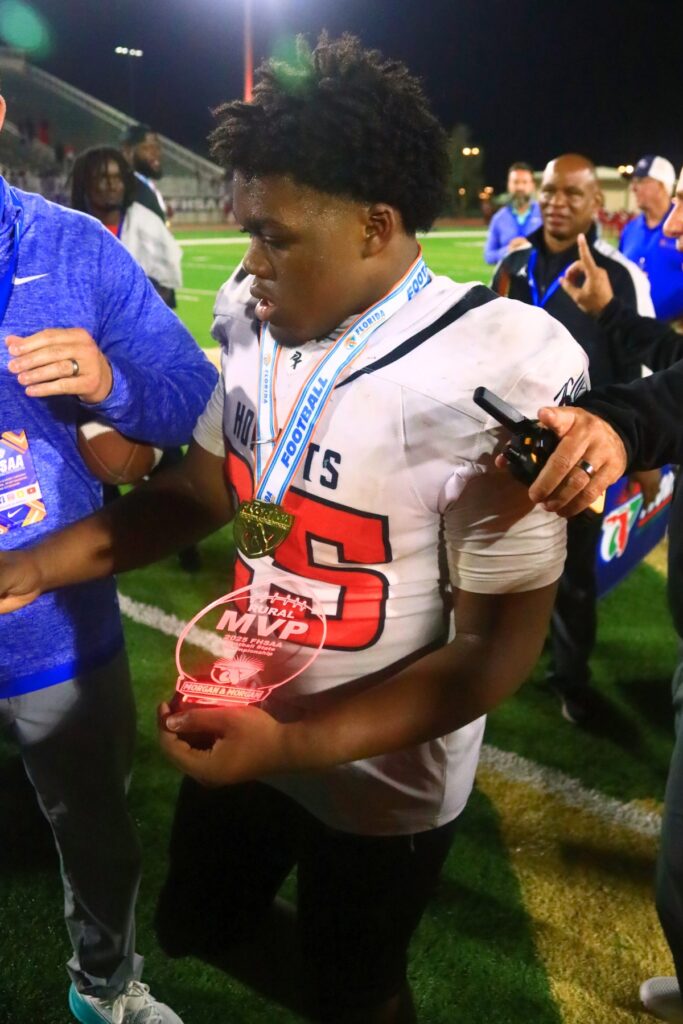 Hawthorne's Derryek Gillins (25) received the game MVP in the Hornets' win against Blountstown in the FHSAA Rural State Championship game. Photo by C.J. Gish