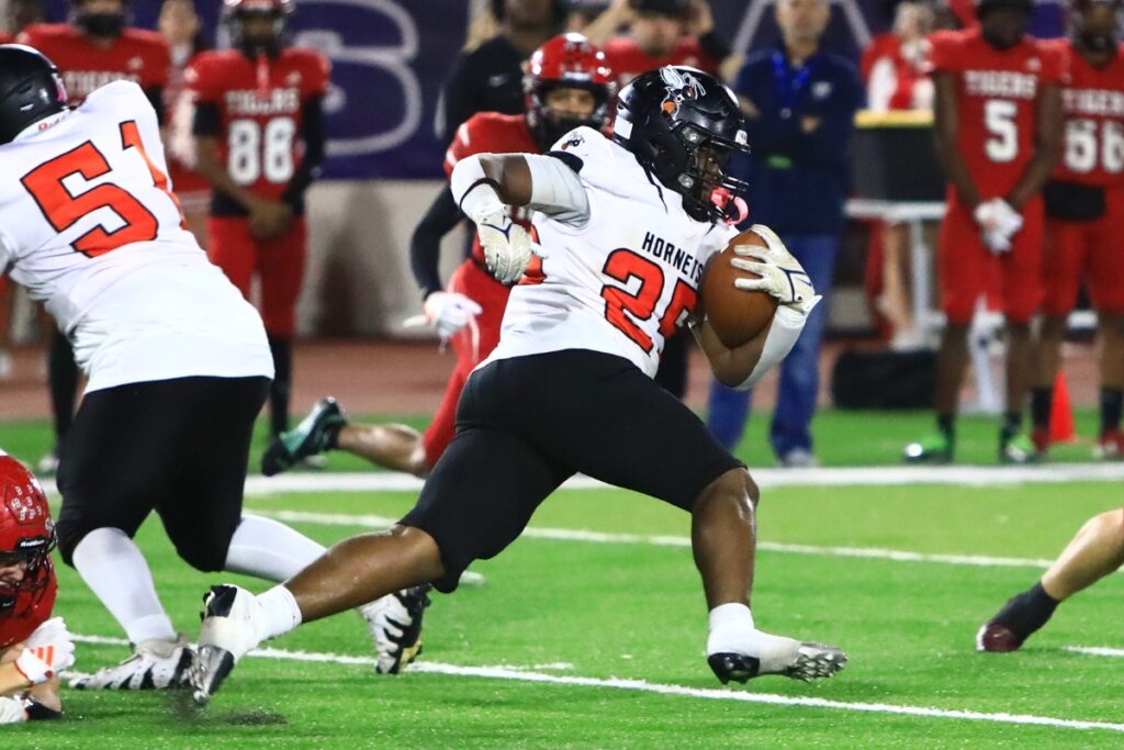 Hawthorne's Derryek Gillins (25) with a second-quarter run against Blountstown in the FHSAA Rural State Championship game. Photo by C.J. Gish
