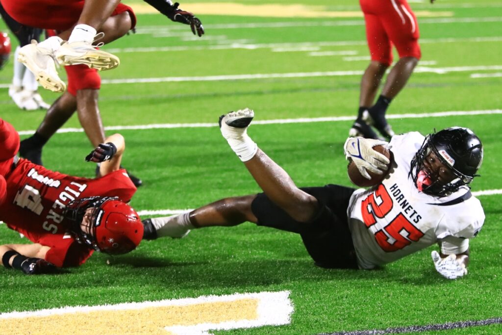 Hawthorne's Derryek Gillins (25) with a second-quarter touchdown against Blountstown in the FHSAA Rural State Championship game. Photo by C.J. Gish