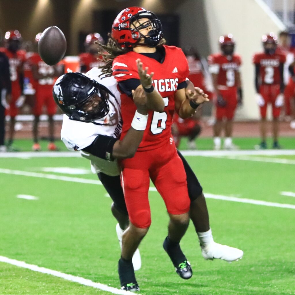 Hawthorne's Dracen Martin (26) with a fourth-quarter blindside sack against Blountstown in the FHSAA Rural State Championship game. Photo by C.J. Gish 1 (1)