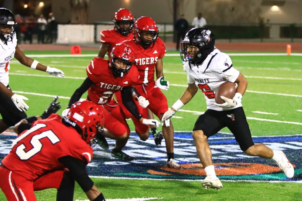 Hawthorne's Raheem Moore (6) with the opening kickoff return against Blountstown in the FHSAA Rural State Championship game. Photo by C.J. Gish