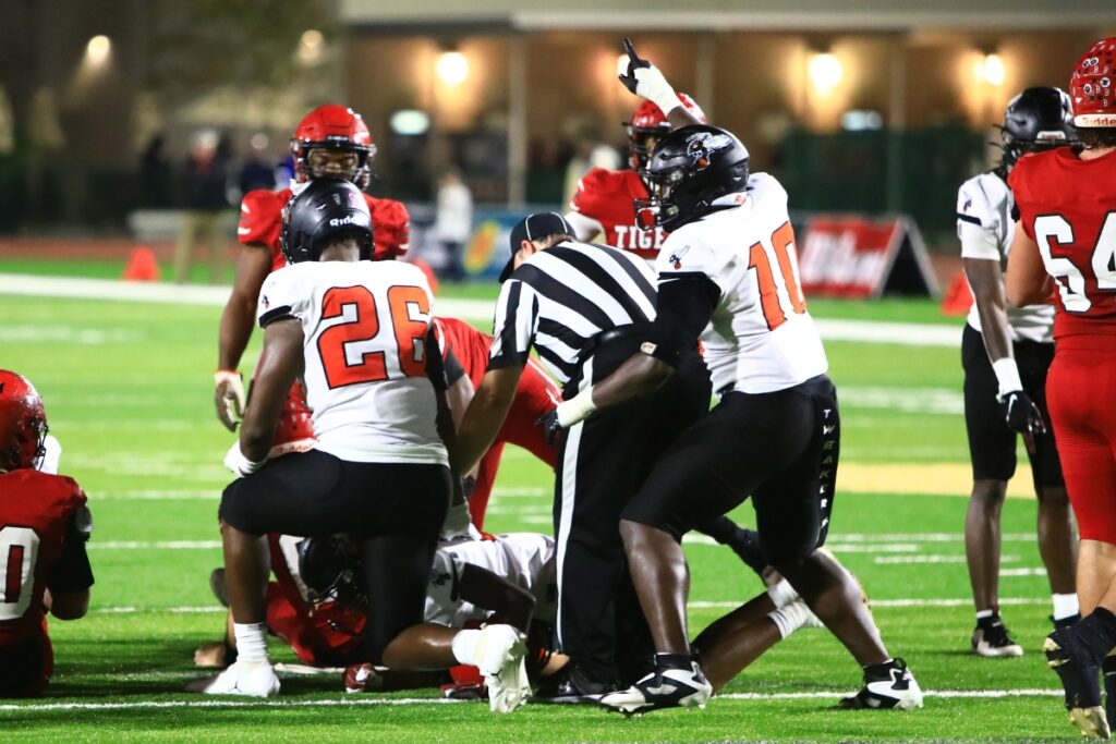 Hawthorne's defense forces a turnover on downs in the second quarter against Blountstown in the FHSAA Rural State Championship game. Photo by C.J. Gish