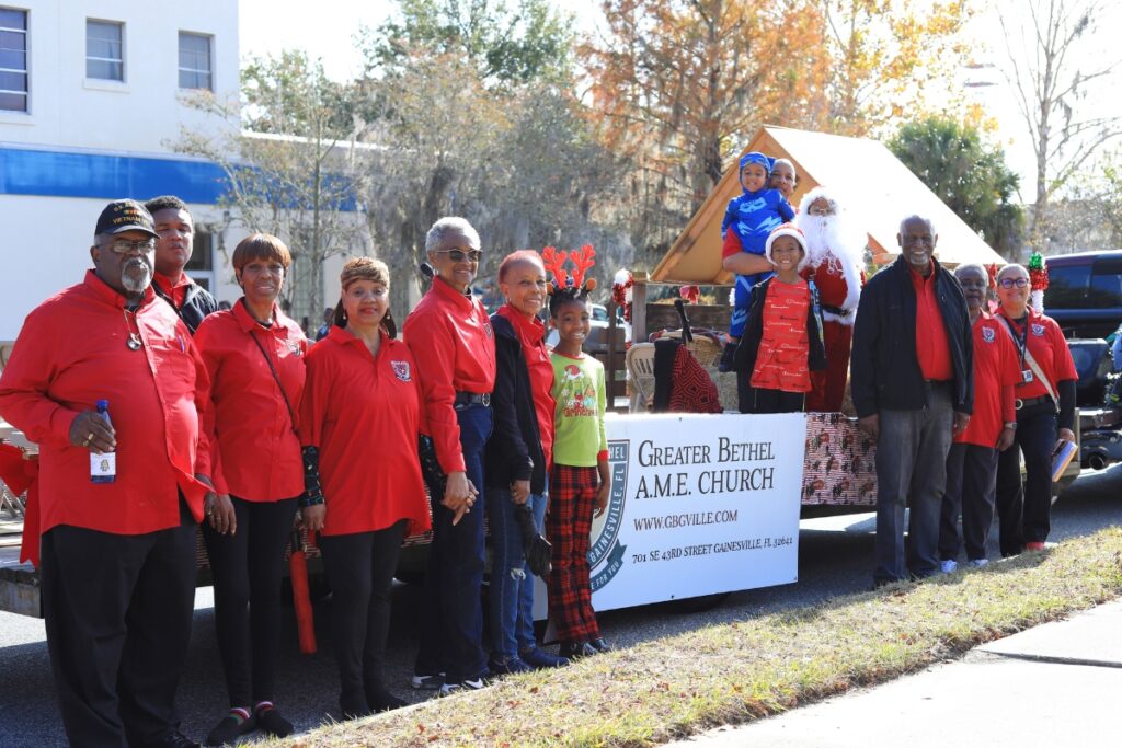 Members of Greater Bethel A.M.E. Church prepare to sing on their float through the parade. Photo by Seth Johnson